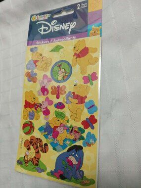 3 pages of vintage stickers in various sizes with Winnie the Pooh designs